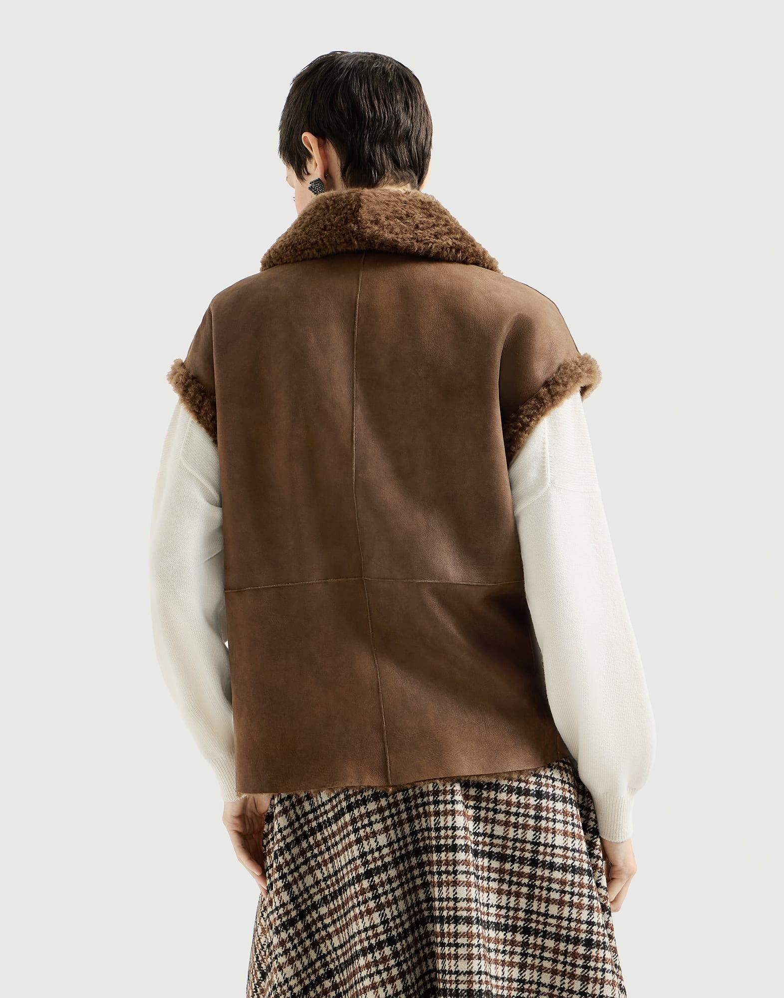 Chaleco reversible en piel de cordero Fuzzy con Monile