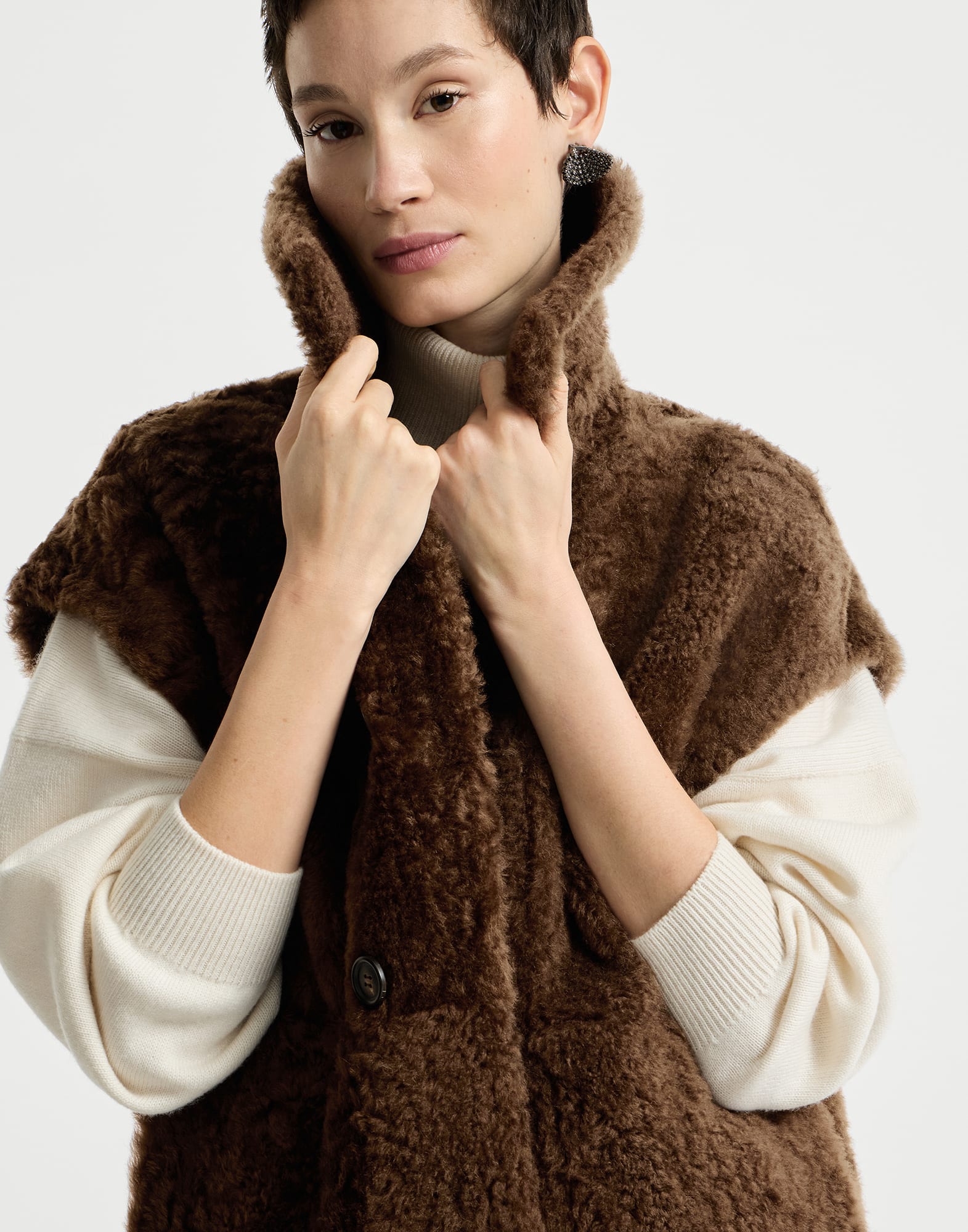 Chaleco reversible en piel de cordero Fuzzy con Monile