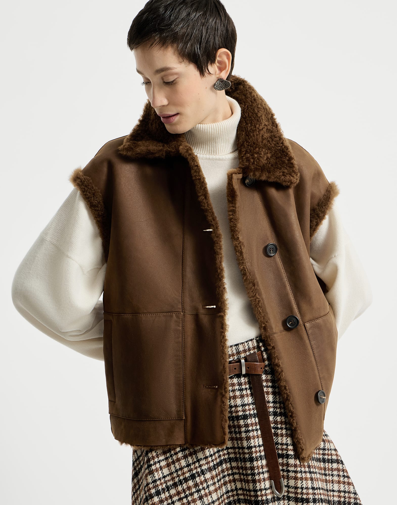 Chaleco reversible en piel de cordero Fuzzy con Monile