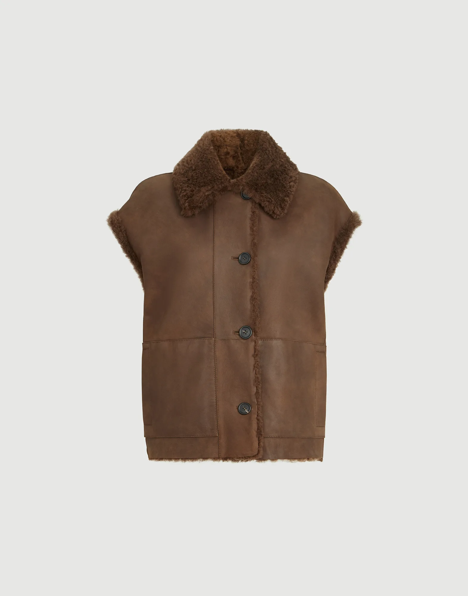 Chaleco reversible en piel de cordero Fuzzy con Monile