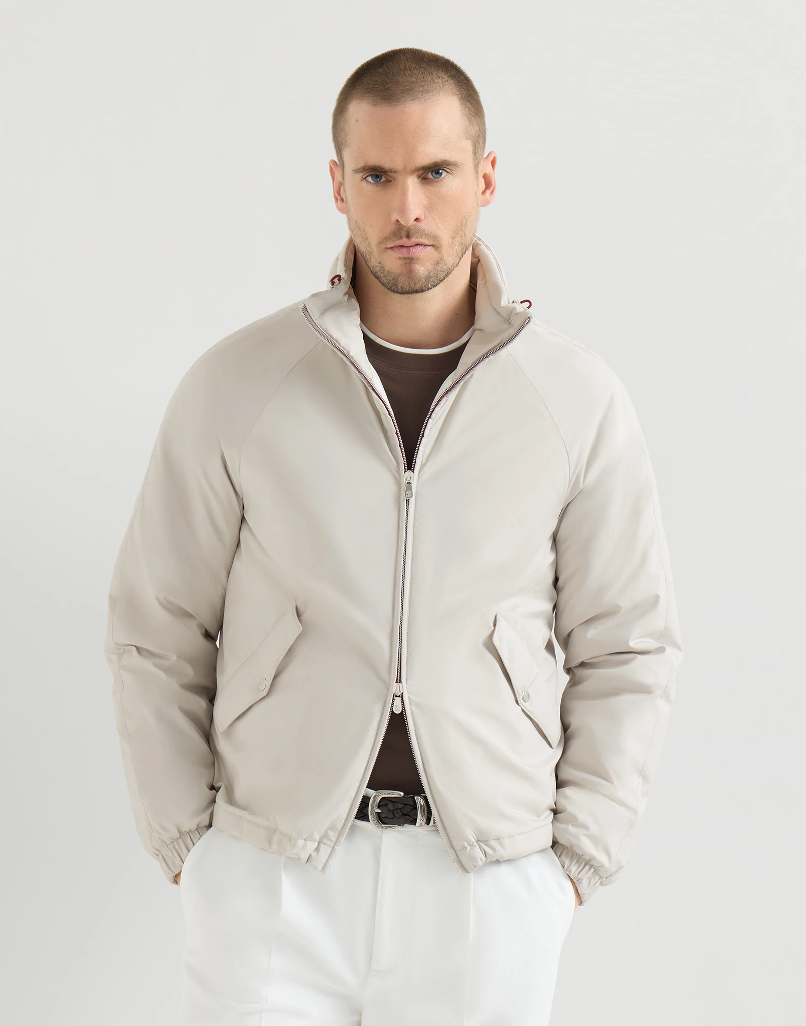 Lightweight nylon outerwear jacket with packable hood