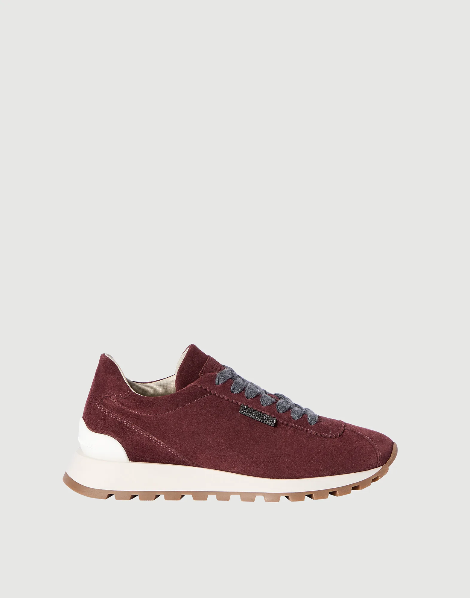 Zapatillas de running en piel de ante con trabilla brillante