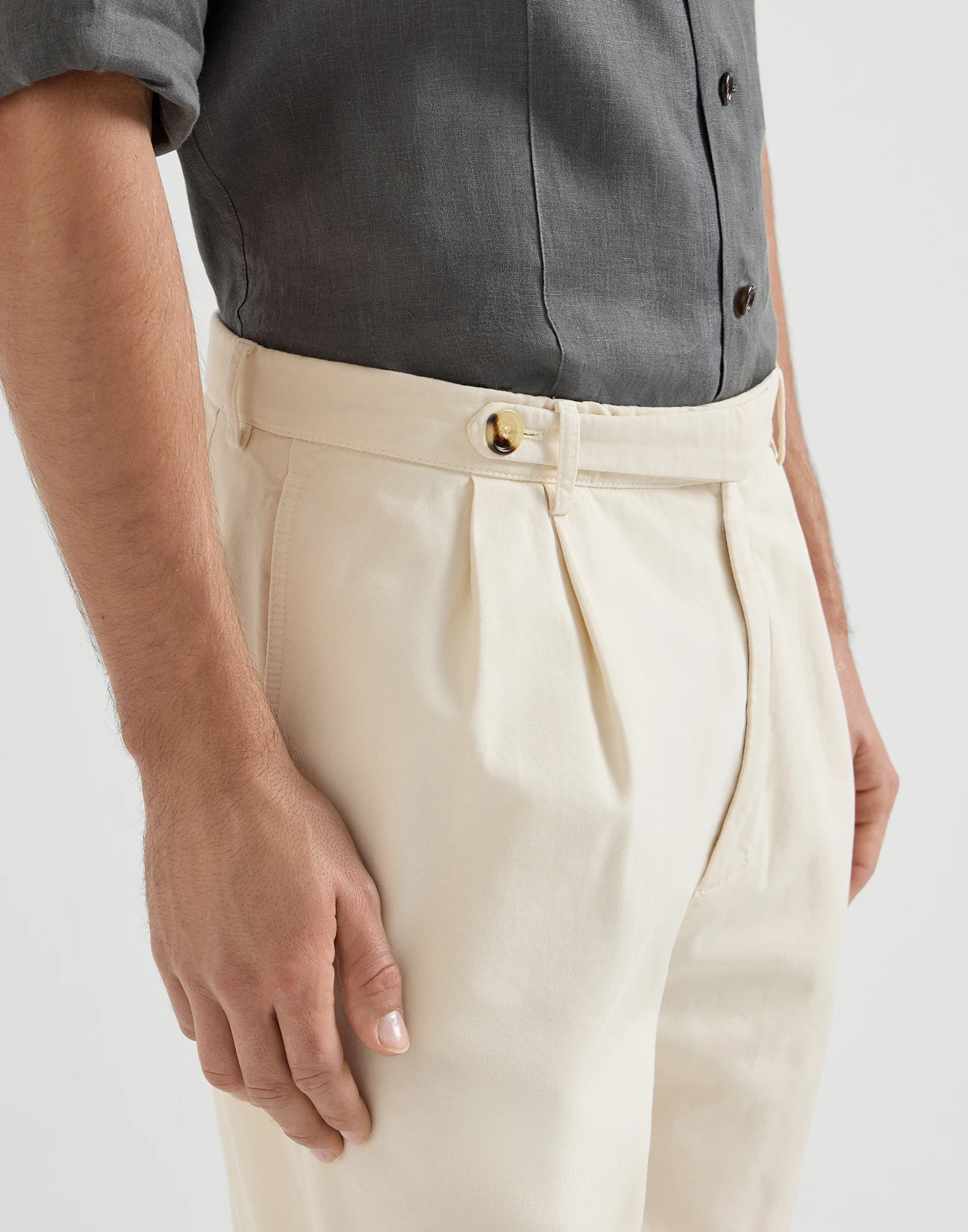 Garment-dyed Bermuda shorts in twisted cotton gabardine with pleats and tabbed waistband