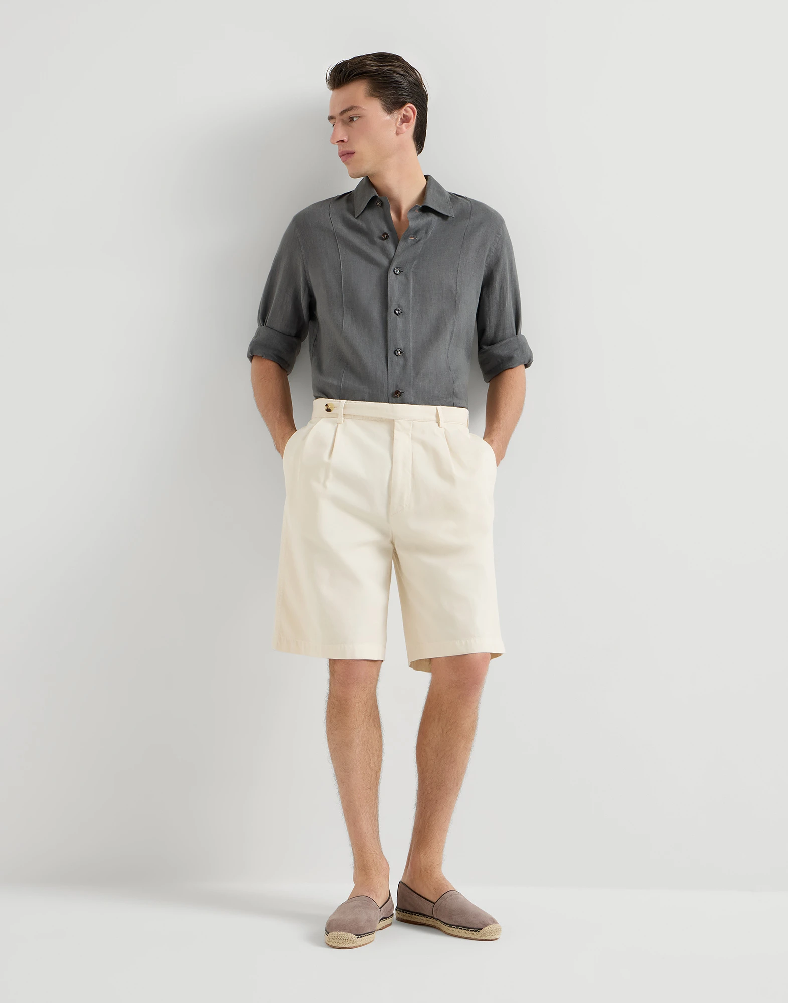 Garment-dyed Bermuda shorts in twisted cotton gabardine with pleats and tabbed waistband