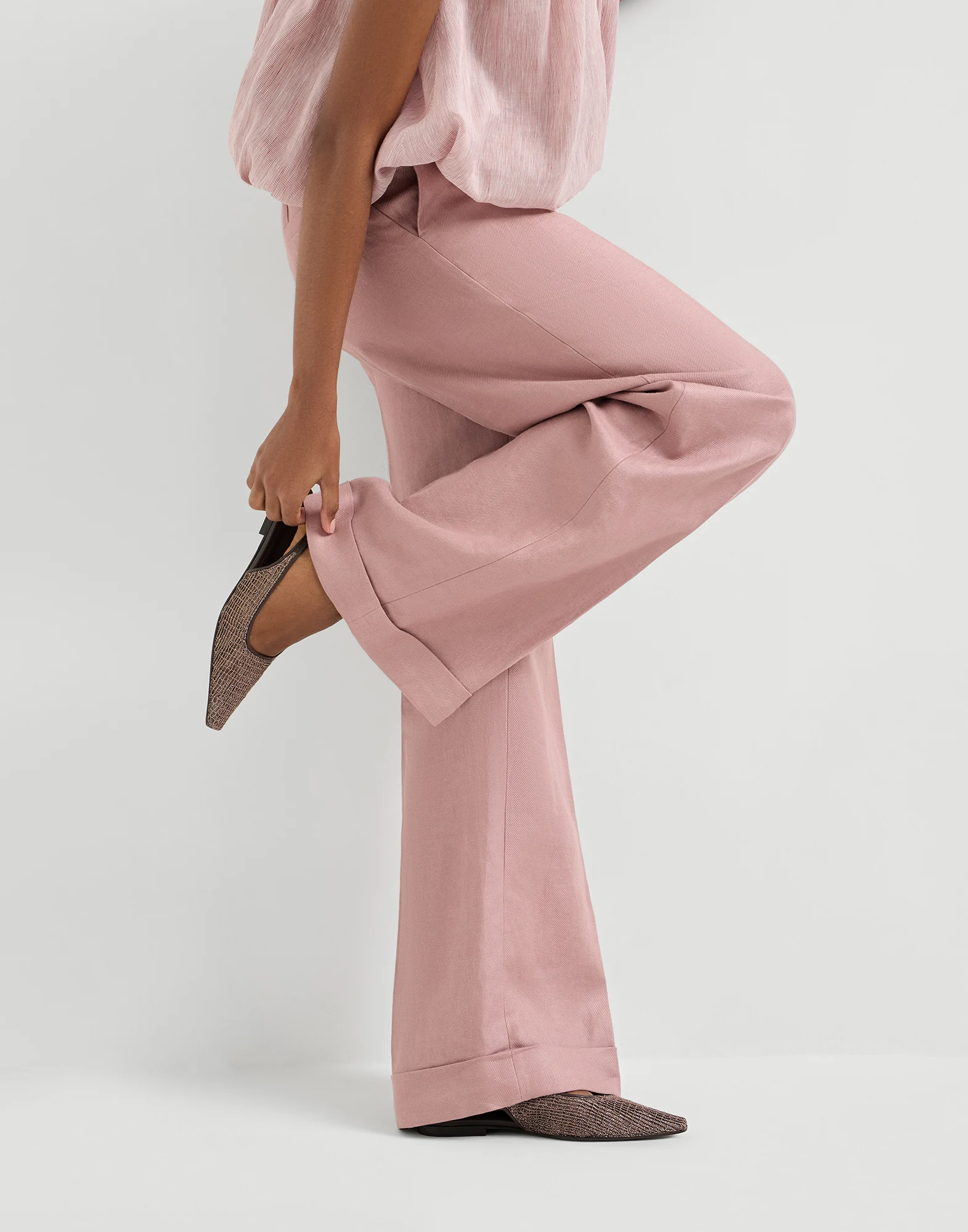Linen diagonal loose flared trousers with monili