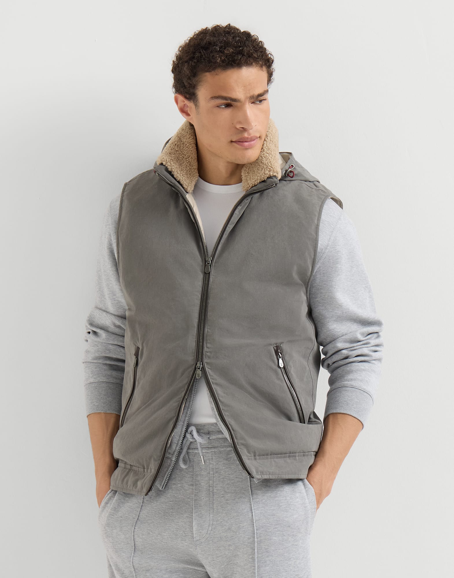 Waxed techno cotton down vest with detachable hood