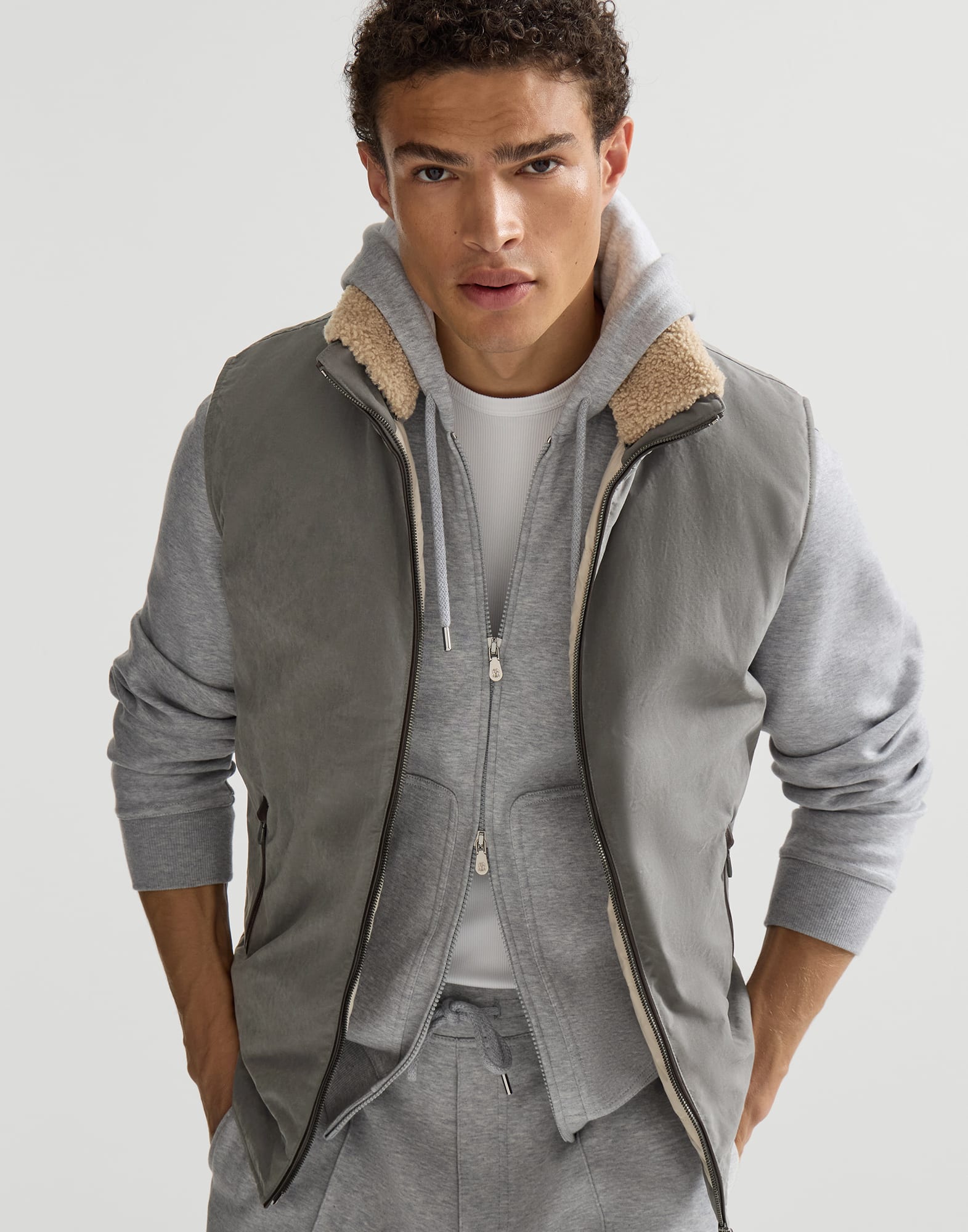 Waxed techno cotton down vest with detachable hood